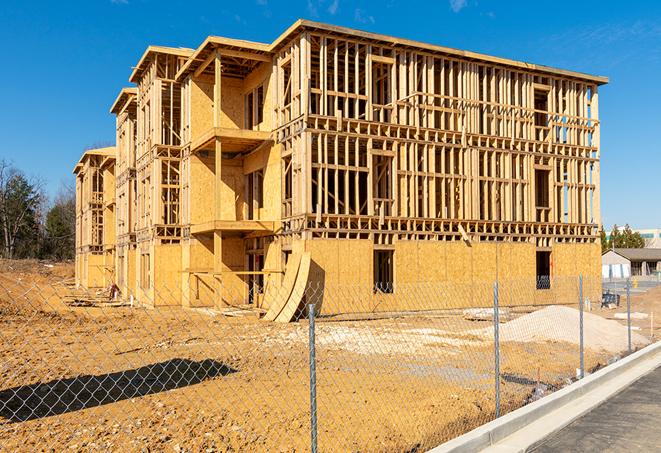 a snapshot of temporary chain link fences protecting a large construction project from unauthorized access in Van Alstyne TX